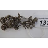 A white metal and marcasite set watch/brooch,