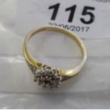 A 9ct gold diamond cluster ring 11