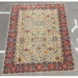 A Persian carpet with stylised animals,