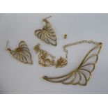A 9ct gold organic design necklace;