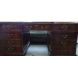 A modern burr walnut finished desk, the top set with a light brown hide scriber,