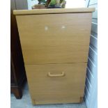 A modern pale oak two drawer filing cabinet,