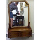 An Edwardian mirror with a two door cabinet below 34''h 17''w HSR