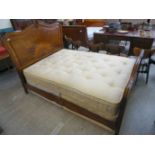 A modern French inspired walnut framed headboard and foot with a Harmony mattress 52''w CA