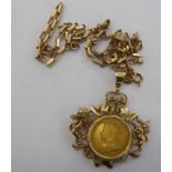 A Victorian sovereign, St George on the obverse 1899, in a 9ct gold mount with crown motifs,