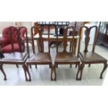 A set of four early 20thC Queen Anne style mahogany framed splat-back dining chairs,