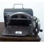 An early 20thC Ideal portable sewing machine cased LAB