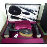 A late Victorian Row & Son ebony dressing table set cased RAB