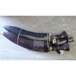 Two 20thC Kukri daggers with fruitwood handles the blades 14.