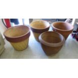 Four similar 20thC pottery garden planters with textured ornament 15''h 16''dia SL