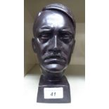 A modern cast and patinated iron bust 'Hitler', on a square,