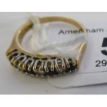 A 9ct gold half eternity ring,