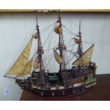 A scratch-built painted model galleon,