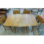 A mid 20thC G-Plan teak drop-leaf dining table, the top with rounded corners,