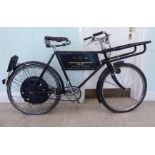 A late 1950s Raleigh delivery boy's bicycle in black livery with a Lepper moulded hide saddle,