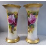 A pair of Royal Worcester blush ivory glazed china vases of waisted cylindrical form with flared