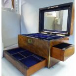 A mid/late 19thC (unfitted) figured walnut veneered and lacquered brass vanity box with straight