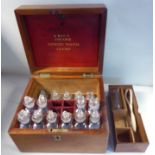 A late Victorian 'Maw's Portable Domestic Medical Cabinet' the mahogany box with a hinged lid,