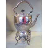 An Edwardian silver plated tea kettle of oval,