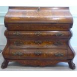 A late 18thC Dutch walnut and floral marquetry bombe front, two part bureau,