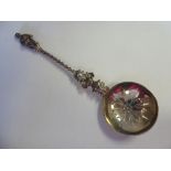 A late Victorian silver sifter spoon, the round bowl with uniformly pierced ornament,