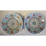 A pair of late 18thC Chinese porcelain, footed, wavy edged saucer dishes,