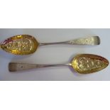 A pair of George III Scottish silver Old English pattern berry spoons indistinct Edinburgh maker's