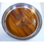 A modern turned mahogany and bead bordered silver decanter coaster,
