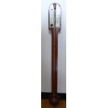 A late 19thC mahogany stick barometer, the round arched,