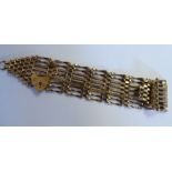 A 9ct gold eight bar, gate-link bracelet,