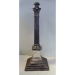 A late Victorian silver lamp base, the reeded column with a Corinthian capital,