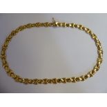 An 18ct gold flexible tablet link necklace,