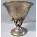 A 1920s Danish silver cup shaped bowl, elevated on a scrolled,