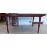 A 1970s AH McIntosh & Co rosewood veneered dining table,