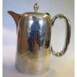 An Edwardian silver hot water pot of tapered cylindrical form with an insulated hollow loop handle,
