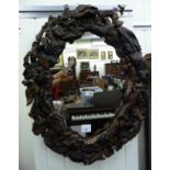 A driftwood framed,