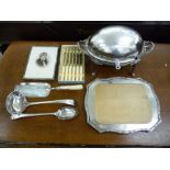 Silver plated tableware: to include an early 20thC serpentine outlined bread board 12''w LAB