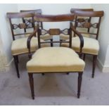 A set of five Regency satinwood inlaid mahogany framed dining chairs,