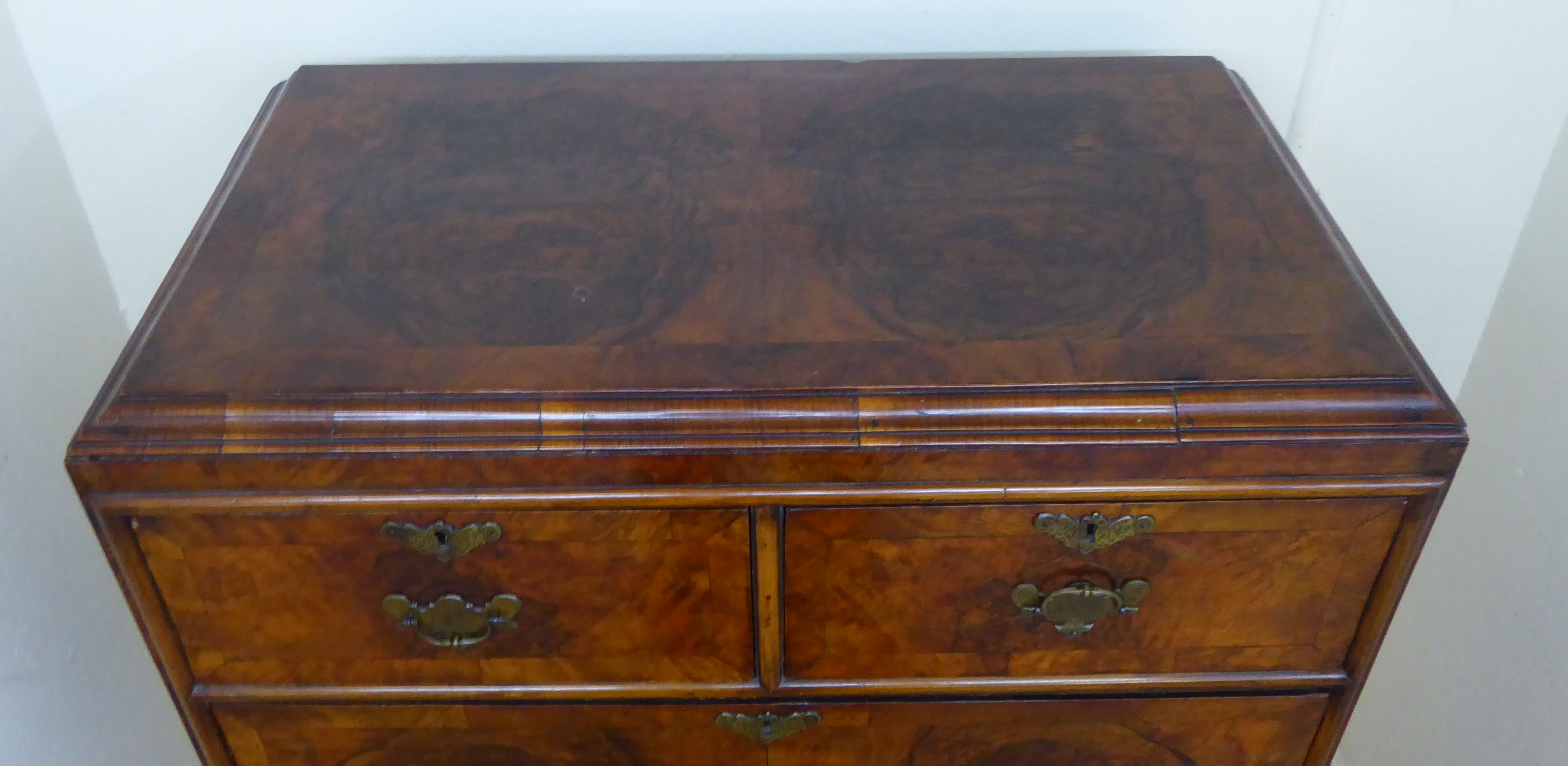 A George III walnut veneered chest on a later stand, - Image 6 of 12