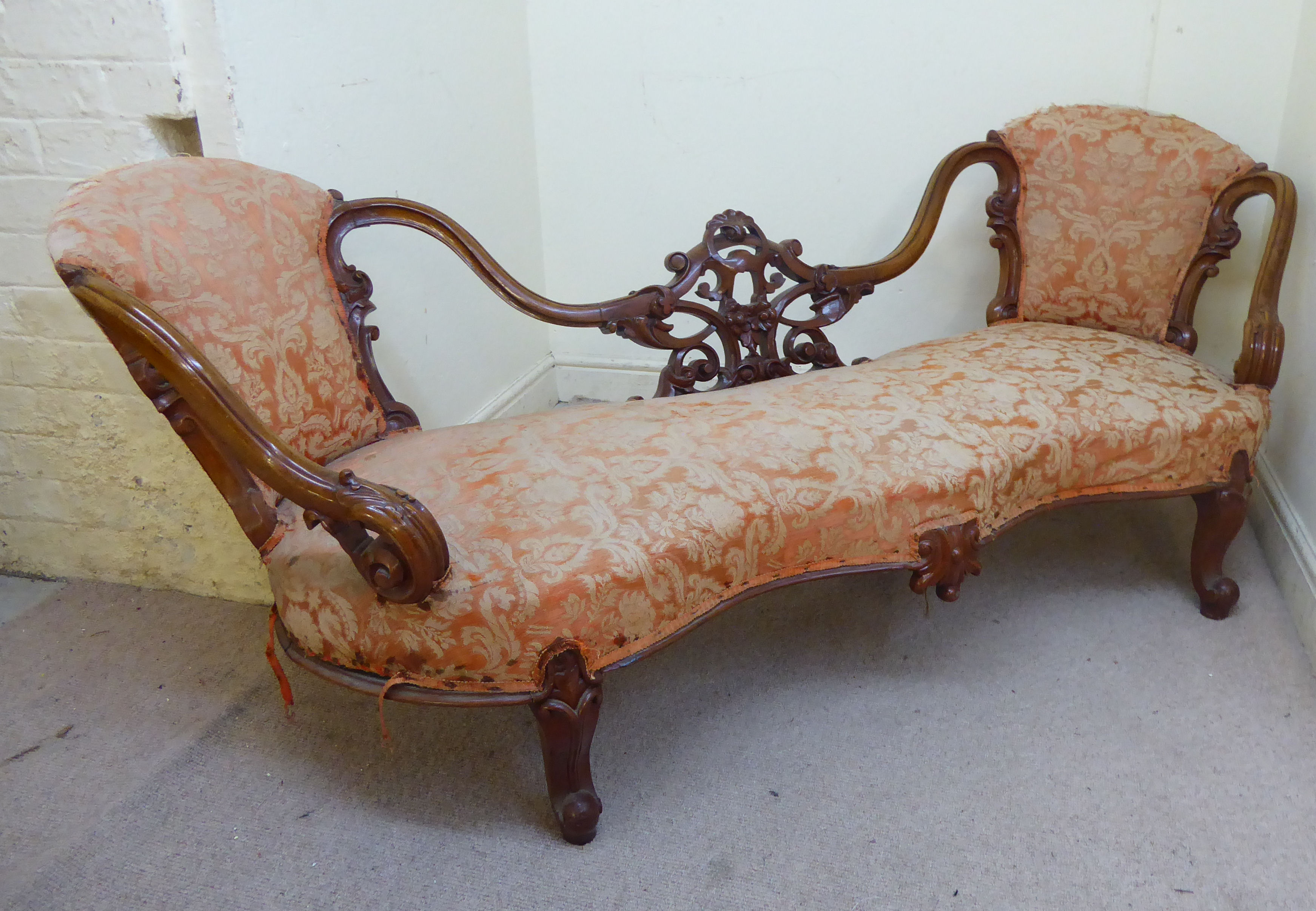 A late Victorian walnut framed double end salon settee,