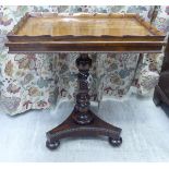 A William IV rosewood centre table, the top with a raised, carved edge and an applied bead frieze,