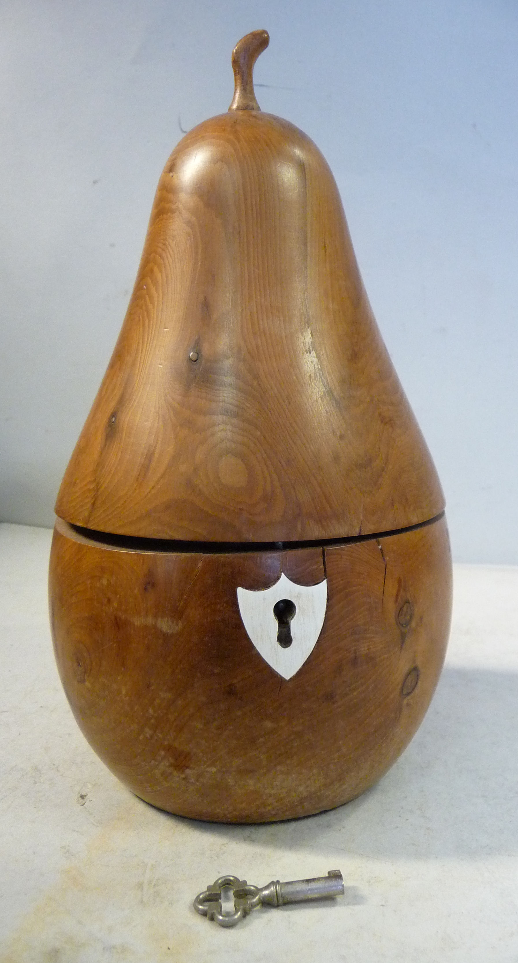 A 20thC turned and carved fruitwood tea caddy, in the form of a pear with a lockable, hinged lid 7. - Image 2 of 8