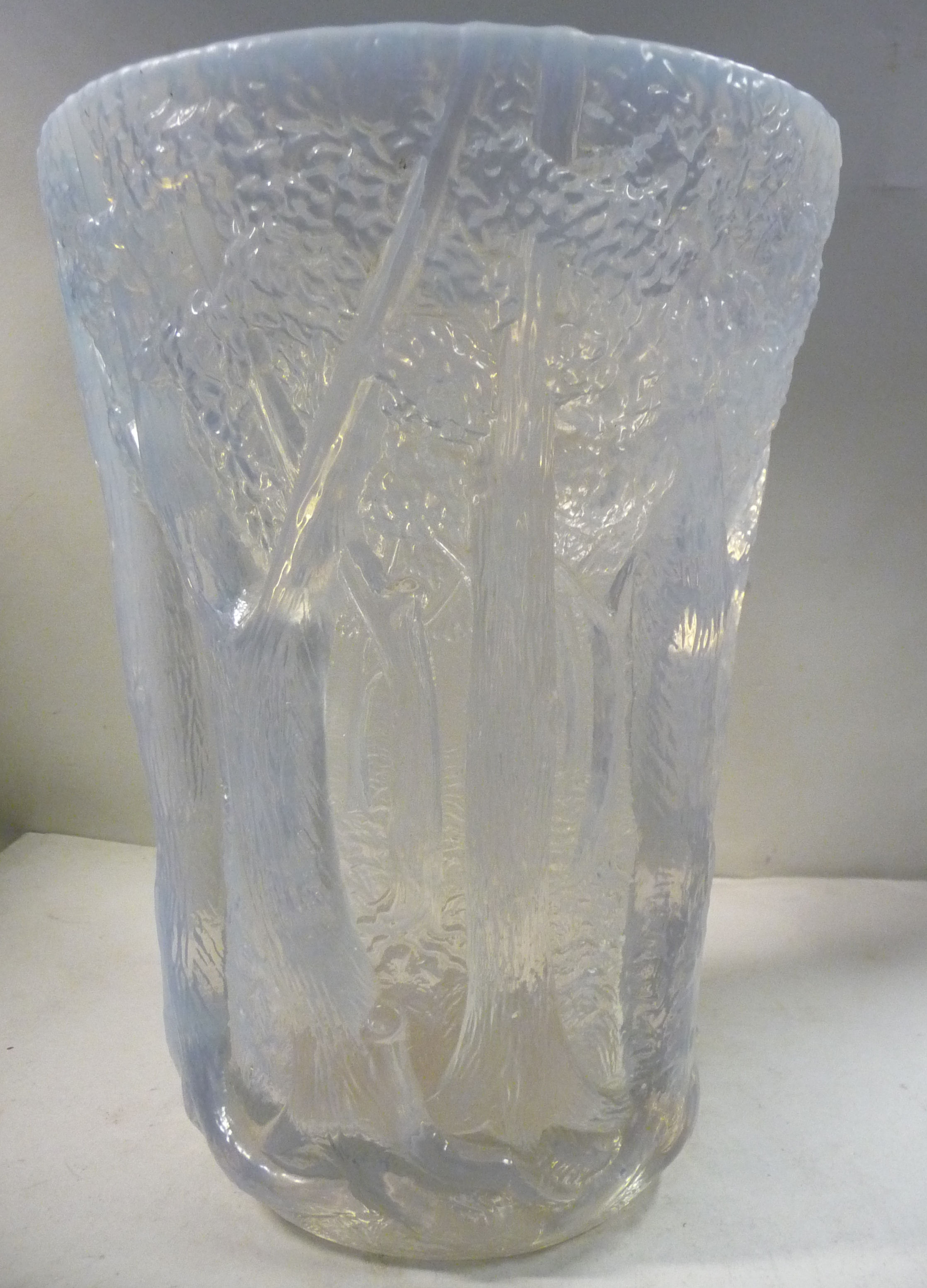 A 1930s French irridescent glass vase of tapered form,