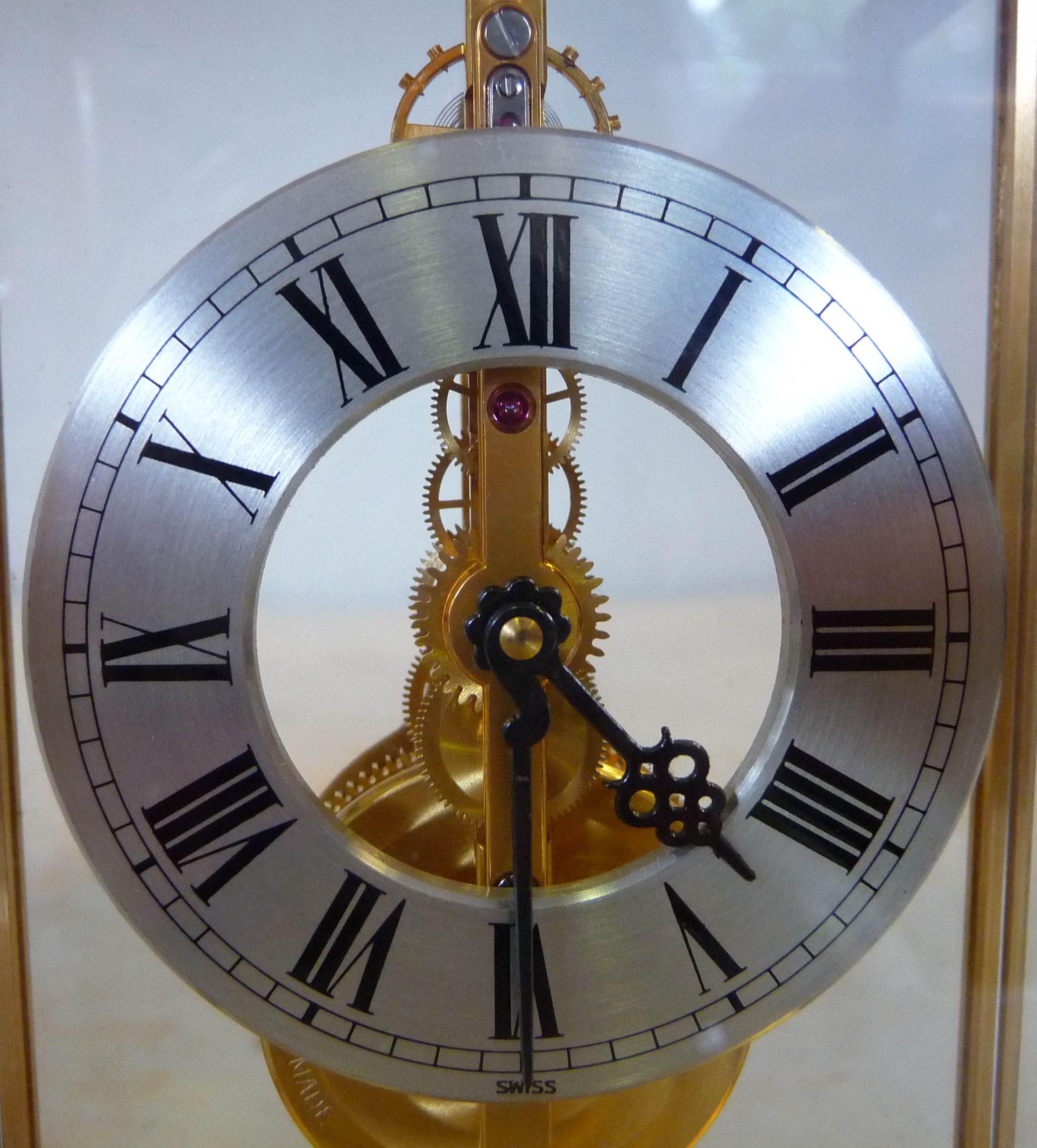 A Jaeger LeCoultre lacquered brass cased and clear laminate panelled miniature skeleton timepiece - Image 3 of 14