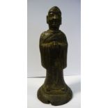 A 17th/18thC Chinese cast bronze figure, a robed, standing deity, on a domed plinth 6.