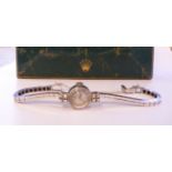 A lady's Rolex 14ct white gold round cased, block-link bracelet wristwatch, faced by a convex,