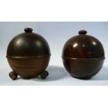 A mid 19thC lignum vitae two part, spherical string box,