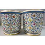 A pair of late 19thC Sevres porcelain cache pots,