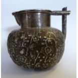 An early 20thC Chinese silver coloured metal cream jug of squat,