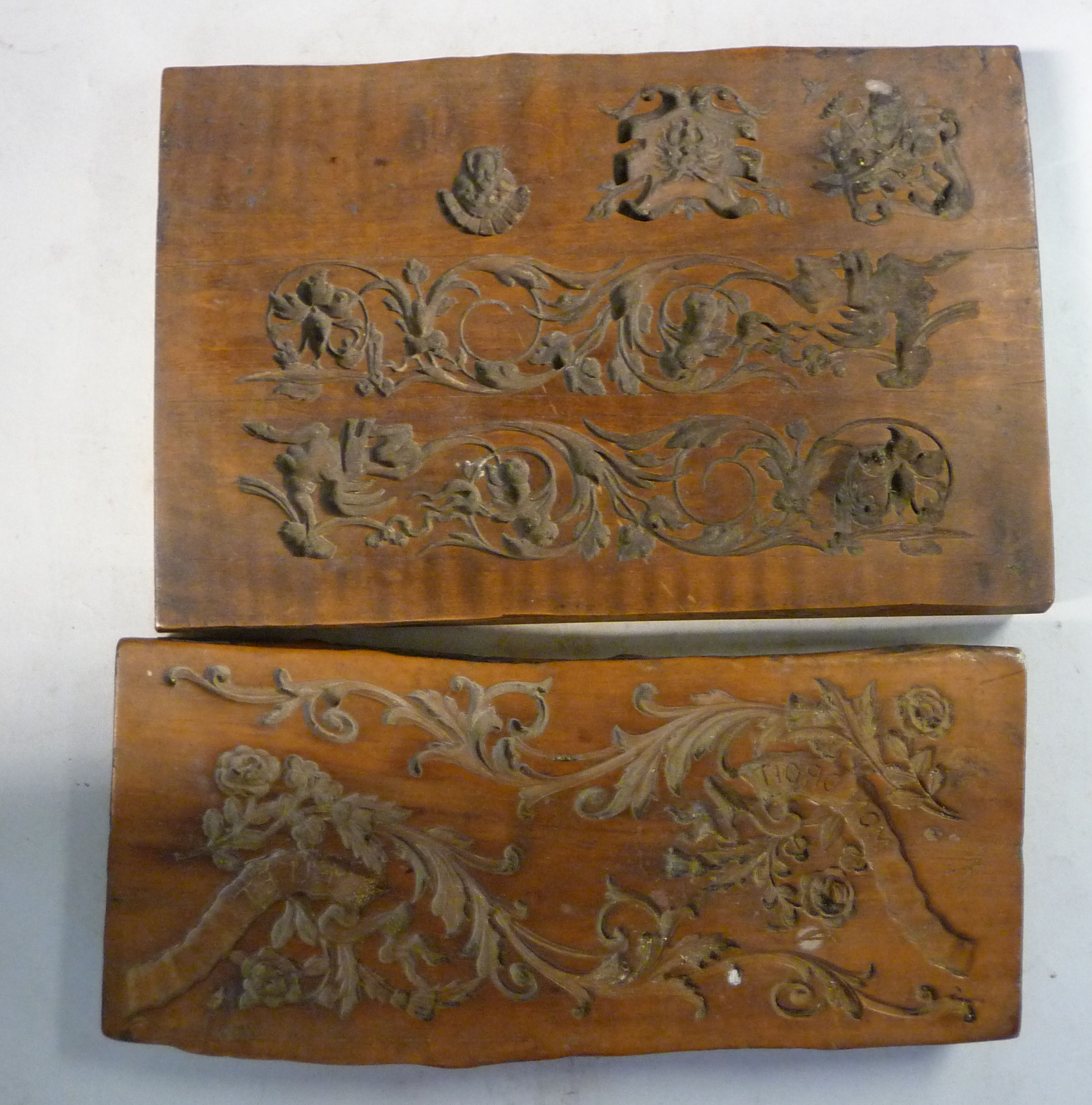 Two similar early 18thC decoratively low relief carved boxwood sugar moulds 9'' x 6'' & 9'' x 4'' - Image 2 of 4